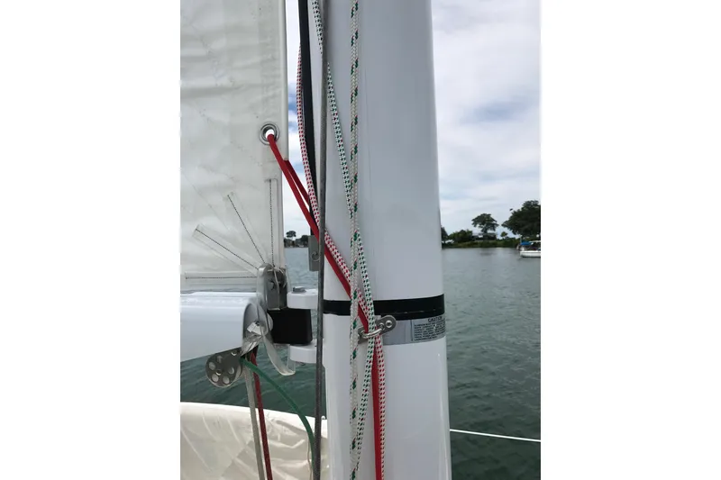 Slide: The Image of Close-up of a 2007 Sabre 386 sailboat mast and rigging on the water. - 144
