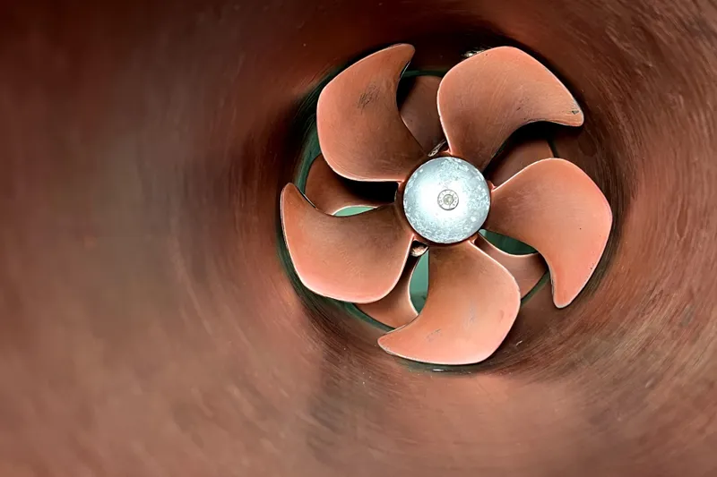 Slide: The Image of Close-up of a Sabre 386 boat propeller, 2007 model, inside a cylindrical housing. - 156