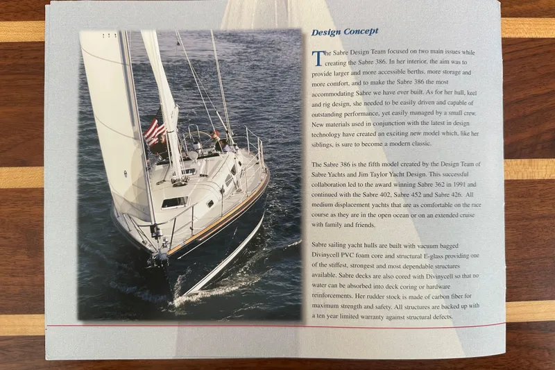 Slide: The Image of Sailing yacht Sabre 386, 2007 model, cruising on water with detailed design concept text. - 175