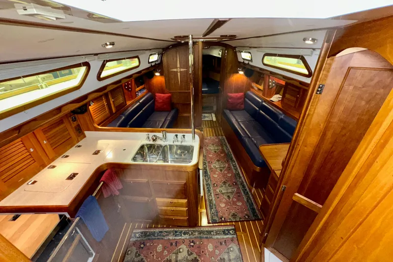 Slide: The Image of Luxurious interior of 2007 Sabre 386 yacht with wood finish and modern amenities. - 18