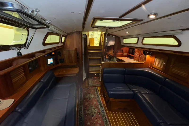 Slide: The Image of Luxurious interior of a 2007 Sabre 386 yacht with elegant wood and leather furnishings. - 24