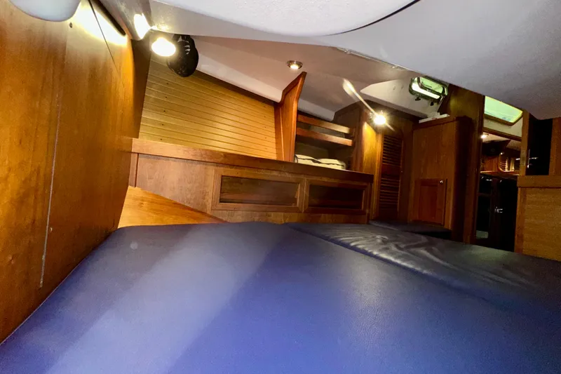 Slide: The Image of Cozy cabin interior of 2007 Sabre 386 yacht with wooden furnishings. - 32