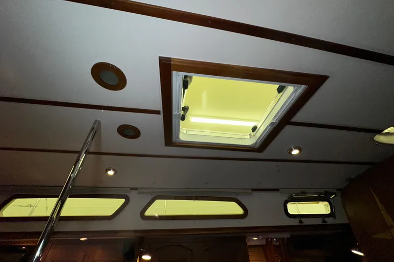 Slide: The Image of Interior view of 2007 Sabre 386 yacht ceiling with skylight and recessed lighting. - 65