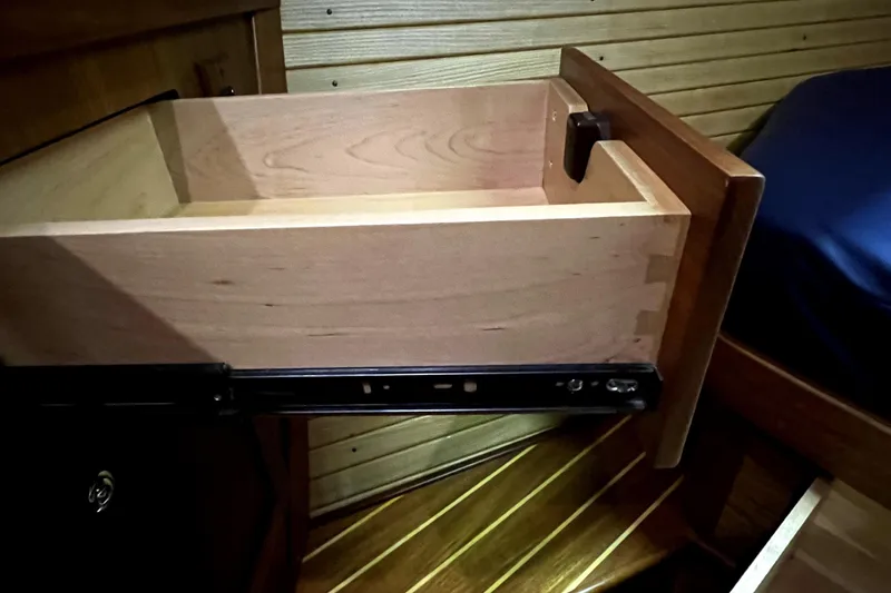 Slide: The Image of Wooden drawer in a 2007 Sabre 386 yacht interior, showcasing craftsmanship and design. - 66