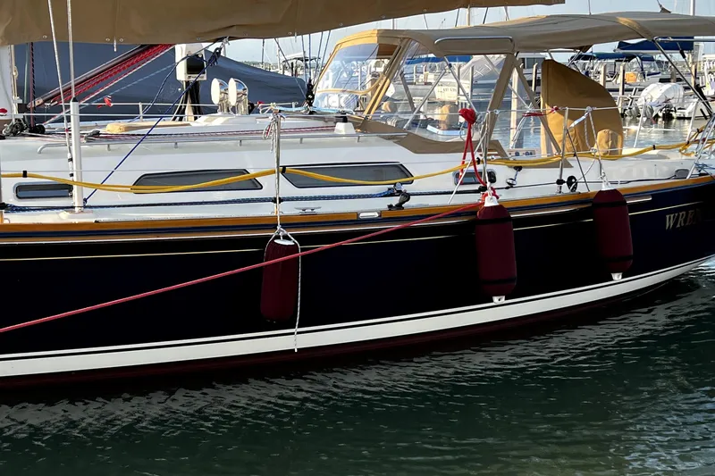 Slide: The Image of 2007 Sabre 386 sailboat docked at marina with protective fenders. - 7
