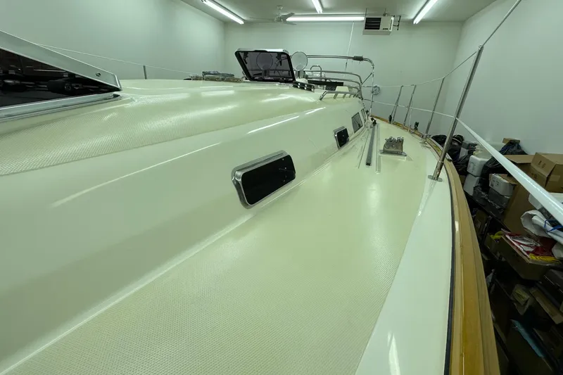Slide: The Image of 2007 Sabre 386 yacht deck in storage, showcasing sleek design and clean lines. - 73