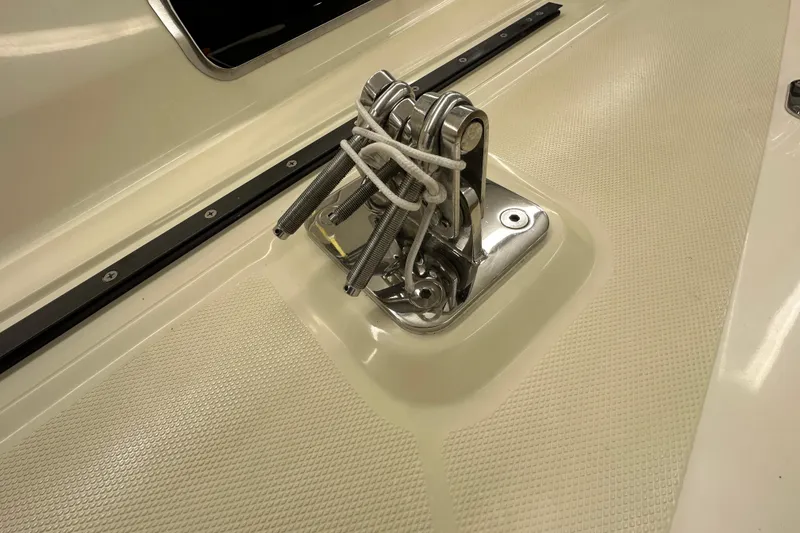 Slide: The Image of Deck hardware on 2007 Sabre 386 sailboat, featuring cleats and rigging components. - 79