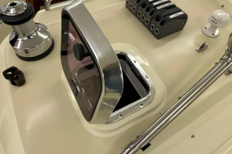 Slide: The Image of Deck of 2007 Sabre 386 sailboat with open hatch and winch. - 88