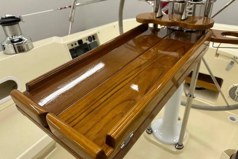 Slide: The Image of Polished wooden tray on 2007 Sabre 386 yacht cockpit, showcasing craftsmanship and design. - 92