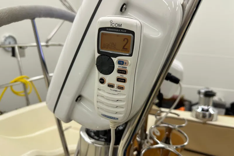 Slide: The Image of VHF radio on a 2007 Sabre 386 sailboat, featuring Icom Submersible Plus model. - 95