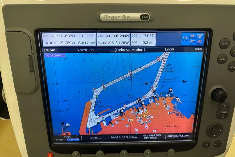 Slide: The Image of Raymarine E120 navigation display showing nautical chart on Sabre 386, 2007 model. - 96