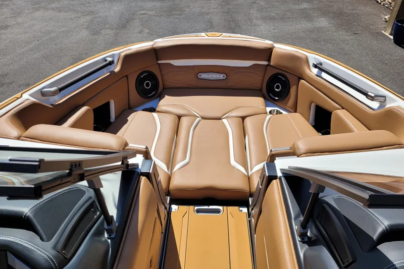 Slide: The Image of Luxurious interior of 2026 Supra SV 400 boat with tan leather seating and modern design. - 12