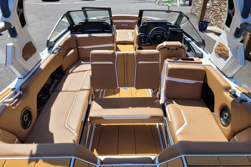 Slide: The Image of Luxurious interior of 2026 Supra SV 400 boat with tan leather seating. - 15