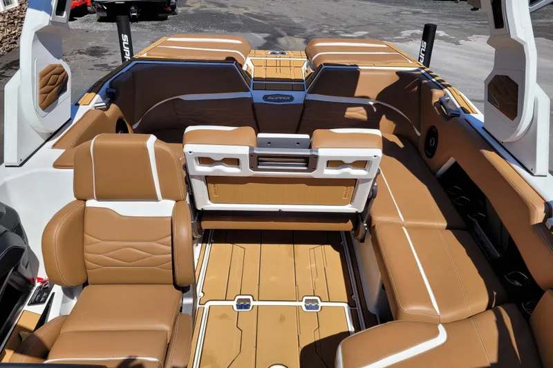 Slide: The Image of 2026 Supra SV 400 boat interior with luxurious tan leather seating and modern design. - 16