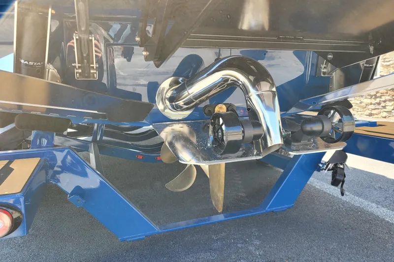 Slide: The Image of 2026 Supra SV 400 boat stern with propeller and exhaust system. - 22