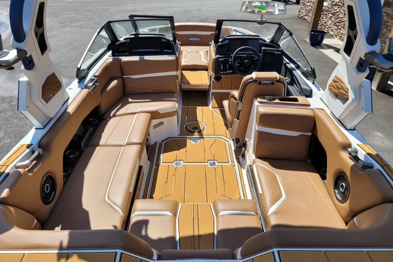 Slide: The Image of 2026 Supra SV 400 boat interior with luxurious tan seating and modern dashboard. - 9