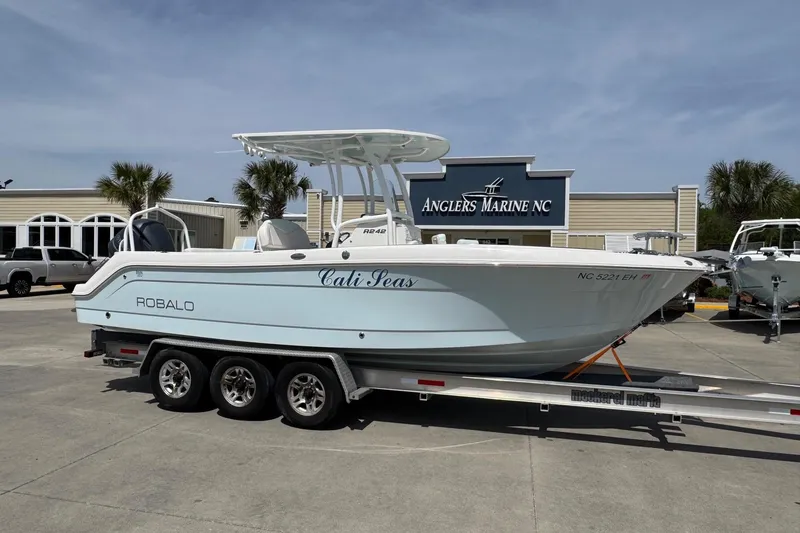 The Image of 2018 Robalo R242 Center Console boat on trailer at Anglers Marine NC. - 1
