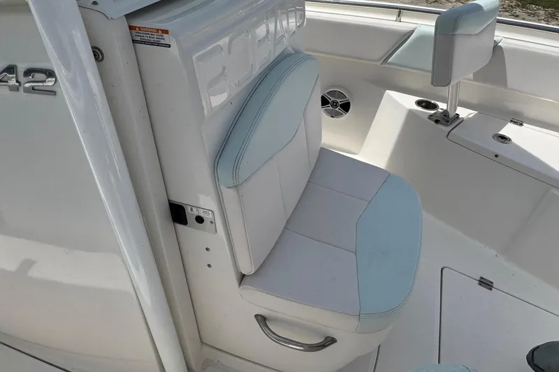 Slide: The Image of Interior of a 2018 Robalo R242 Center Console boat. - 12