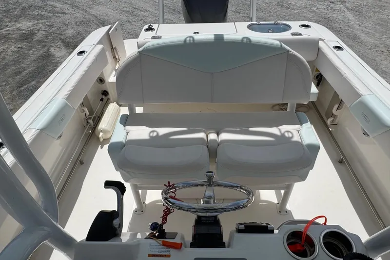 Slide: The Image of Interior view of a 2018 Robalo R242 Center Console boat. - 14