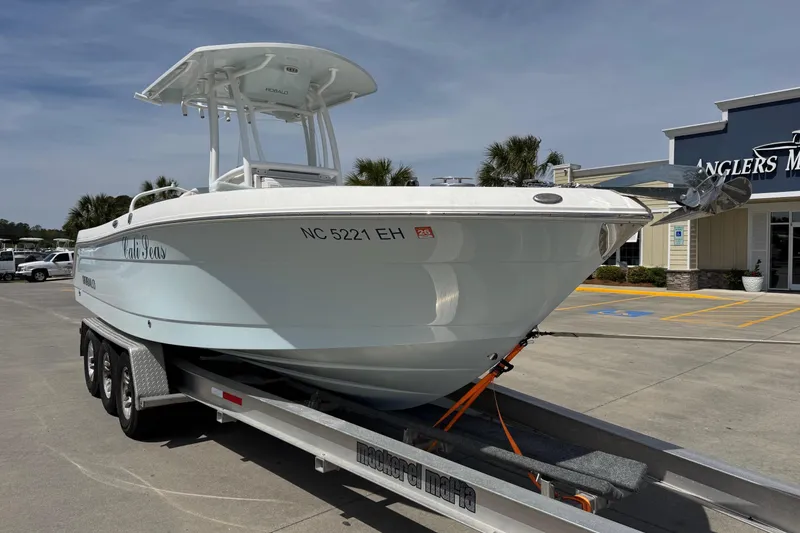 Slide: The Image of 2018 Robalo R242 Center Console on trailer at Anglers Marine. - 2