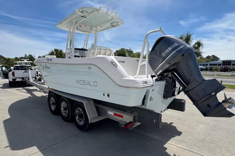 Slide: The Image of 2018 Robalo R242 Center Console boat on trailer. - 5