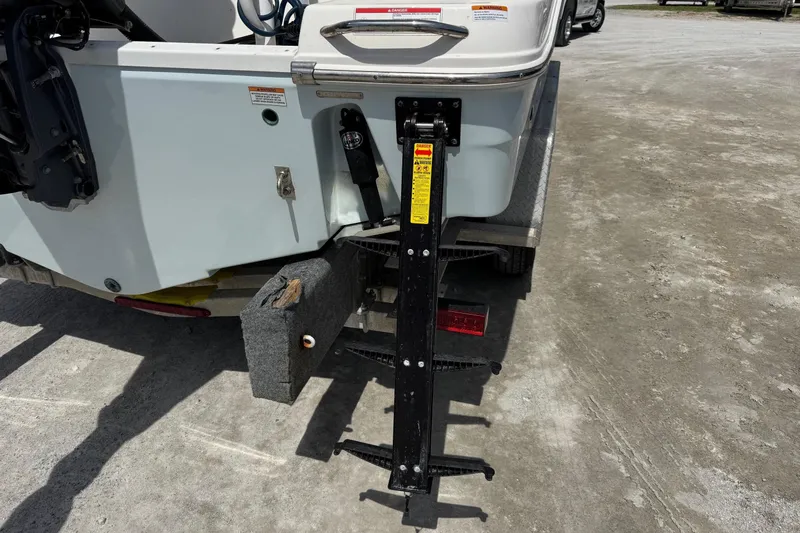 Slide: The Image of 2018 Robalo R242 Center Console boat with trailer. - 7