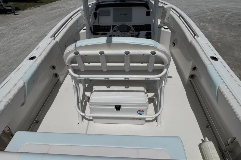 Slide: The Image of Interior view of a 2018 Robalo R242 Center Console boat. - 8