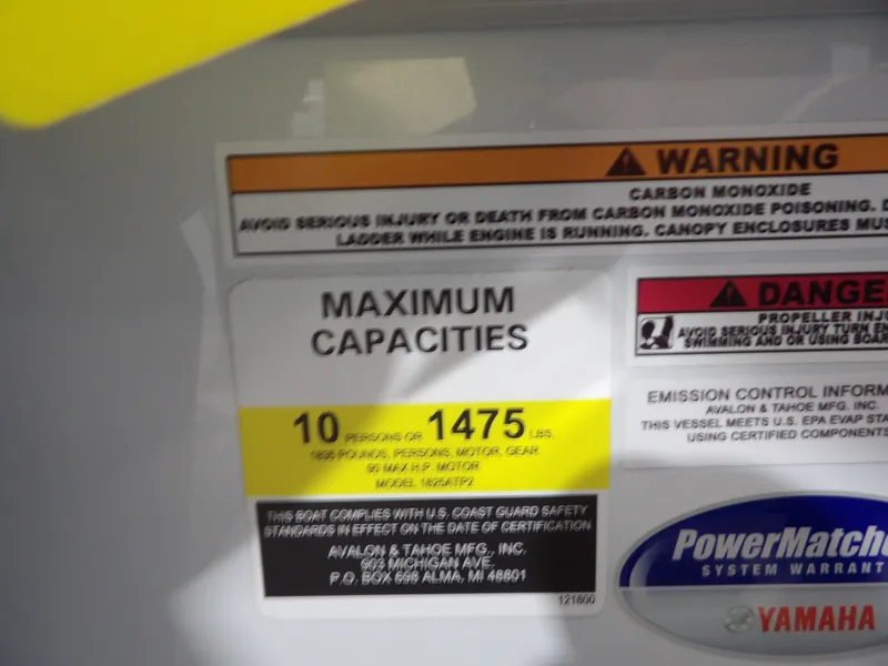 Slide: The Image of Warning label with capacity details for Avalon Venture Quad Fish 2026. - 20