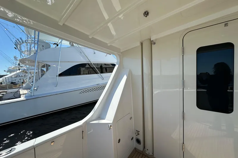 Slide: The Image of Spacious deck of 2017 Kadey-Krogen 58EB yacht with teak flooring and utility area. - 47