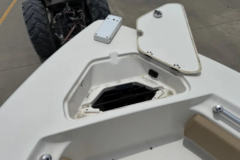 Slide: The Image of Open storage compartment on a 2019 Key West 219 FS boat. - 10