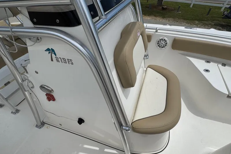 Slide: The Image of Interior view of a 2019 Key West 219 FS boat with seating area. - 13