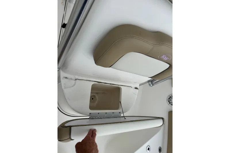 Slide: The Image of Interior view of a 2019 Key West 219 FS boat with seating details. - 14