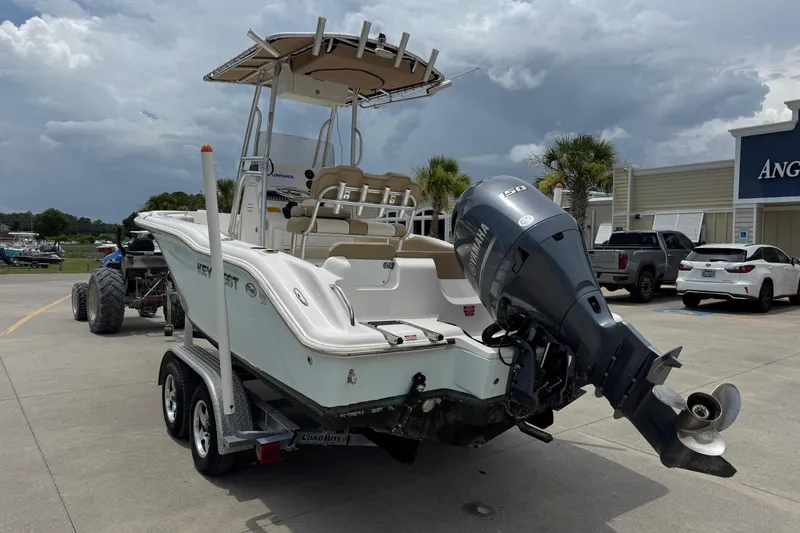 Slide: The Image of 2019 Key West 219 FS boat with Yamaha engine on trailer. - 4