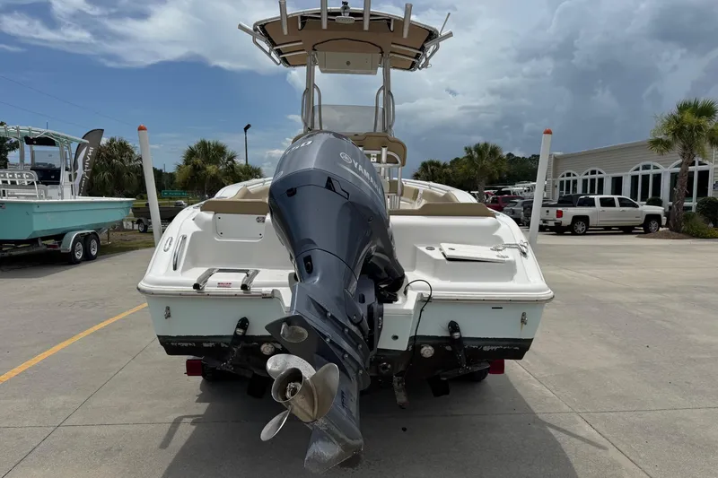 Slide: The Image of Rear view of a 2019 Key West 219 FS boat with outboard motor. - 5