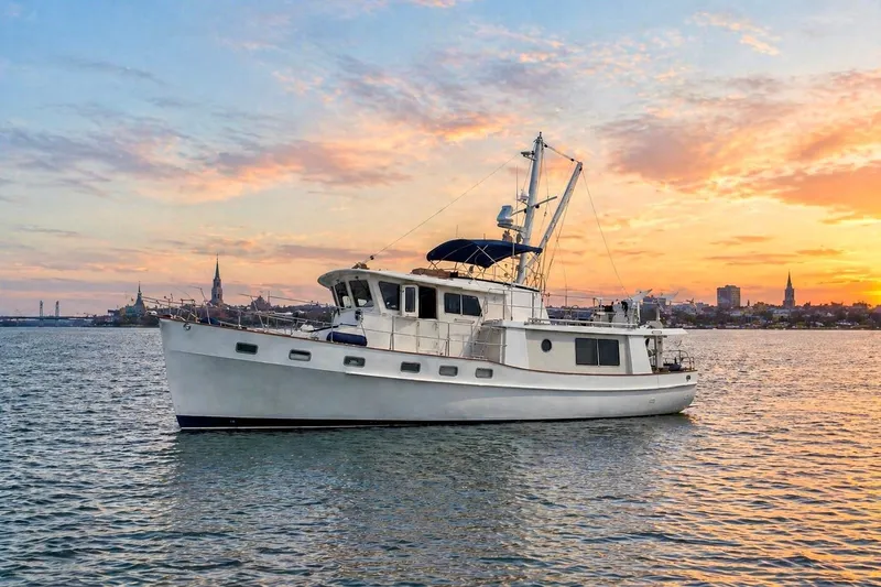The Image of 2008 Krogen 48 North Sea yacht at sunset on the water. - 0