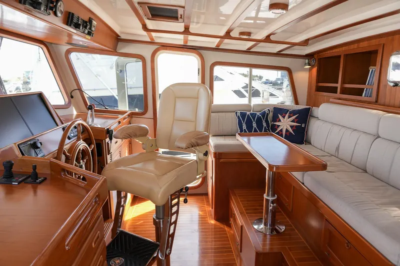 Slide: The Image of Luxurious interior of 2008 Kadey-Krogen 48 North Sea yacht with plush seating and helm. - 16
