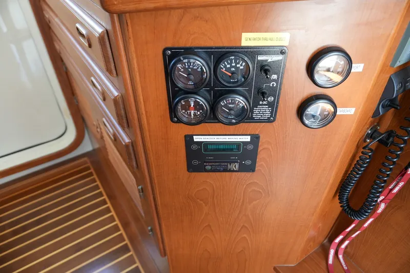 Slide: The Image of Control panel of a 2008 Kadey-Krogen 48 North Sea yacht with gauges and switches. - 19