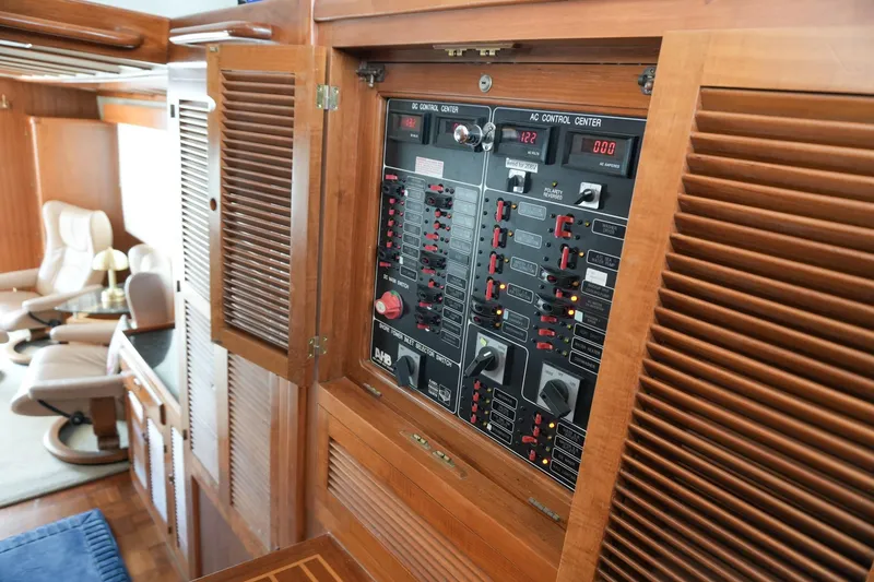 Slide: The Image of 2008 Kadey-Krogen 48 North Sea yacht interior with control panel and seating area. - 28