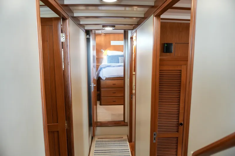 Slide: The Image of Interior hallway of 2008 Kadey-Krogen 48 North Sea yacht with wooden finishes. - 29