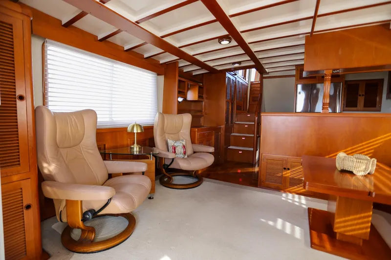 Slide: The Image of Luxurious 2008 Kadey-Krogen 48 North Sea yacht interior with plush seating and elegant wood finishes. - 7