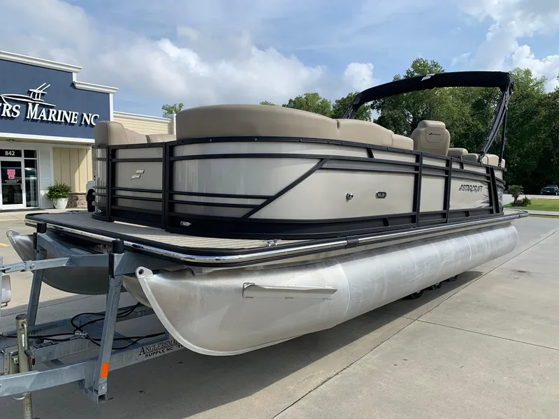 Slide: The Image of 2021 Starcraft SLS 3 pontoon boat on trailer. - 1
