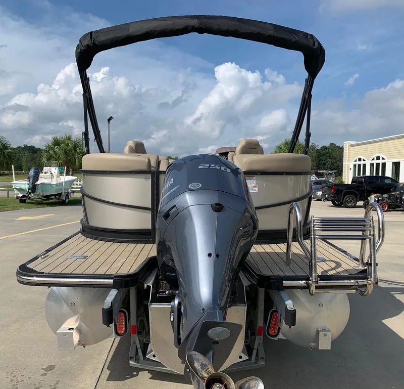 Slide: The Image of 2021 Starcraft SLS 3 pontoon boat with outboard motor. - 3