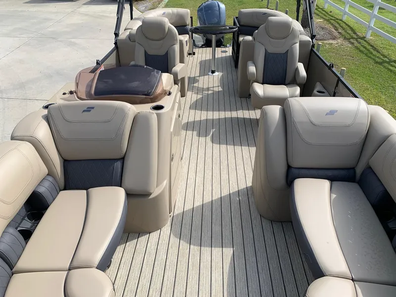 Slide: The Image of Interior of a 2021 Starcraft SLS 3 pontoon boat with luxurious seating. - 4