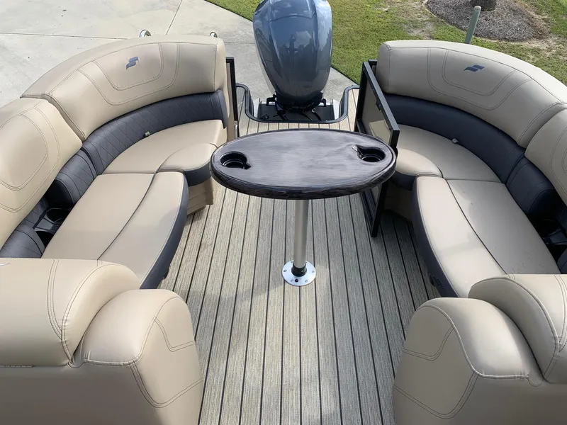 Slide: The Image of Interior of a 2021 Starcraft SLS 3 boat with beige seating and table. - 5