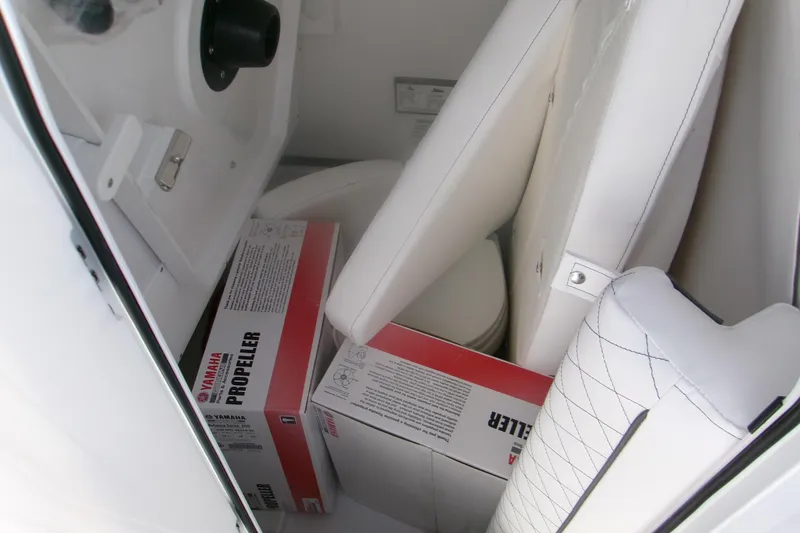 Slide: The Image of Interior of 2026 Sportsman Open 252 Center Console with Yamaha propeller boxes. - 17