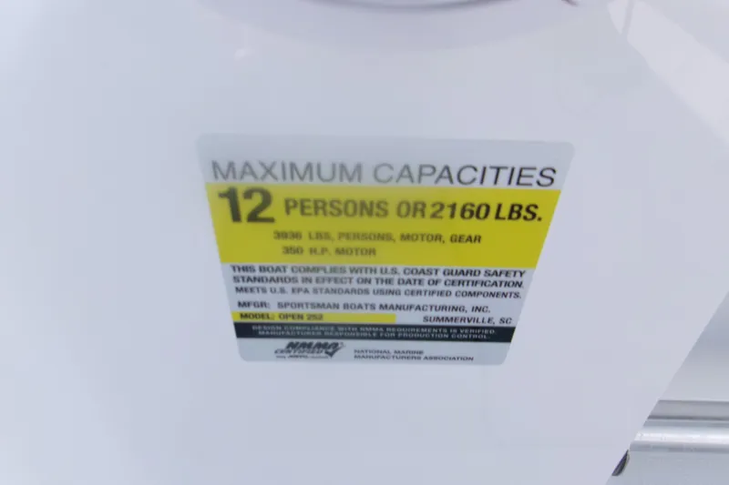 Slide: The Image of 2026 Sportsman Open 252 Center Console capacity label: 12 persons or 2160 lbs. - 18