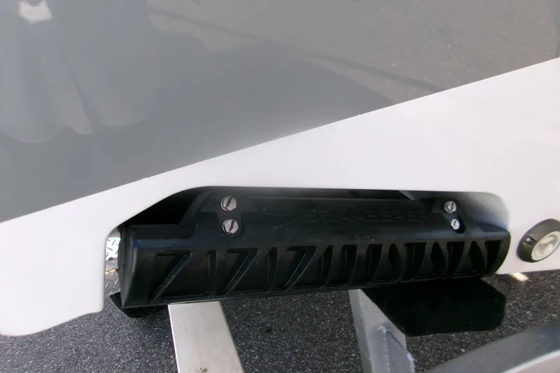 Slide: The Image of 2026 Sportsman Open 252 Center Console boat detail, featuring a Seakeeper stabilizer. - 5
