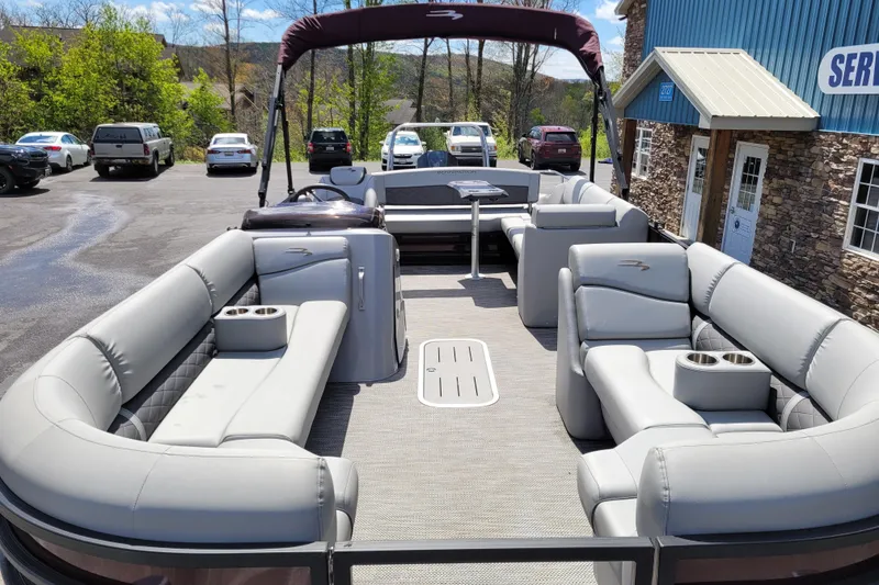 Slide: The Image of 2021 Bennington 24 SSBX pontoon boat with spacious seating and modern design. - 11