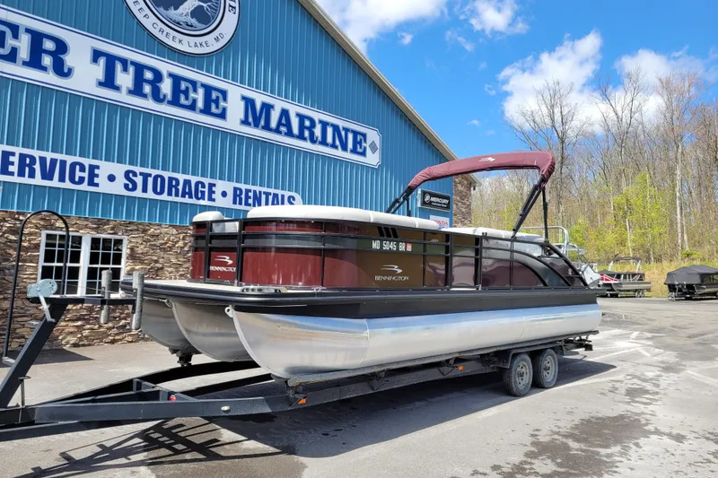 Slide: The Image of 2021 Bennington 24 SSBX pontoon boat on trailer at Blue Tree Marine. - 4