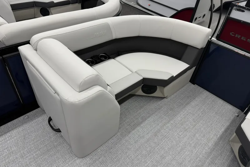 Slide: The Image of Luxurious seating on the 2026 Harris Cruiser 210 CWDH pontoon boat, featuring plush upholstery. - 5